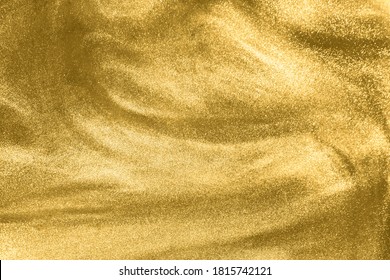 Abstract elegant, detailed gold glitter particles flow with shallow depth of field underwater. Holiday magic shimmering luxury background. Festive sparkles and lights. de-focused. - Shutterstock ID 1815742121