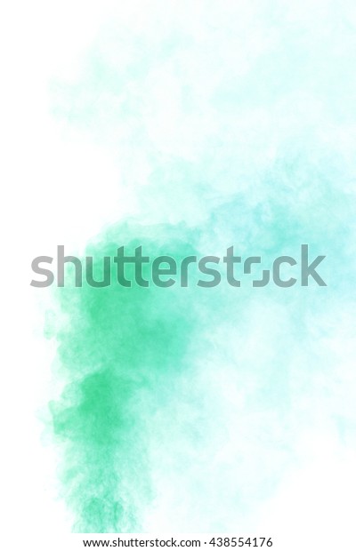 Abstract emerald green water vapor on a white
background. Texture. Design elements. Abstract art. Steam the
humidifier. Macro
shot.