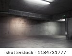 Abstract empty garage interior, background with concrete walls and white ceiling lights