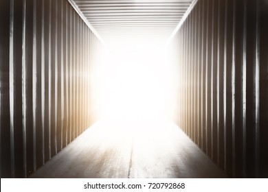 Abstract Empty In Side Container Shipping With Blank White Light Outside.