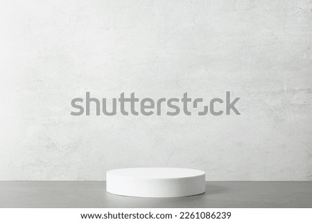 Abstract empty white podium on grey background. Mock up stand for product presentation. 3D Render. Minimal concept. Advertising template