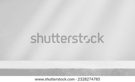Abstract empty white table stage podium with spotlights and white plaster wall background for products, cosmetics and advertising.