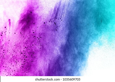 Abstract Explosion Of Blue Purple Dust On White Background.Abstract Blue Purple Powder Splatter On White  Background. Freeze Motion Of Blue Purple Powder Splash.