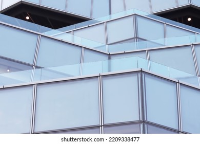 Abstract exterior image of zigzag balconies pattern with aluminum structure and glasses panels show strong geometry form for graphic background use.
 - Powered by Shutterstock