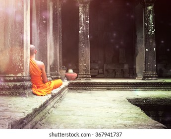 An Abstract Fantasy Photograph Of A Buddhist Monk Meditating In Angkor Wat Temple In Siem Reap Cambodia