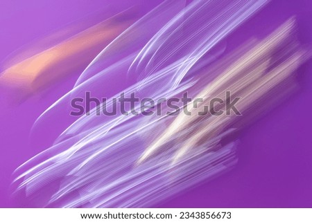 abstract festive cosmic background of blurred golden, silver, orange, white, purple and violet lines