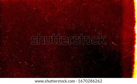 Abstract film texture background with grain, dust and light leak