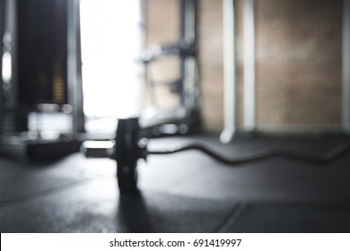 Abstract of fitness gym background with barbell on the floor and treadmill - Powered by Shutterstock