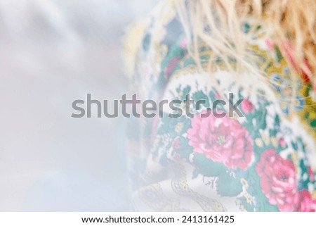 Similar – Image, Stock Photo Young woman wearing a flower shirt and using her phone