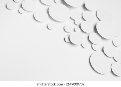 Abstract flow of flying white paper ovals different size in shine light with soft shadows as energy pattern, top view, border, copy space. Contemporary softness airy activity abstract background.