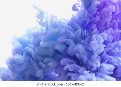 Abstract Flowing Liquid Or Blue Ink In Water On A White Background. It Looks Like Smoke Or Cloud. Or Zero Gravity.