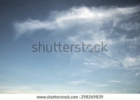 Abstract fluffy white cloud over blue sky background