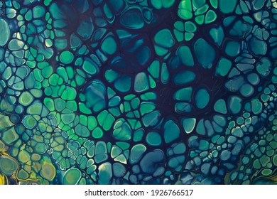 Abstract fluid or liquid art background navy blue and green colors. Acrylic painting on canvas with cyan gradient and splash. Watercolor backdrop with cells and spotted pattern.