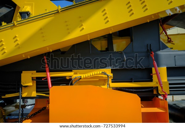 Abstract fragment\
of heavy machinery\
background