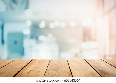 Abstract Front blur wood texture table bar view on clean terrace office window background content for christmas breakfast scene, modern interior grocery shop summer light blue pastel color photography