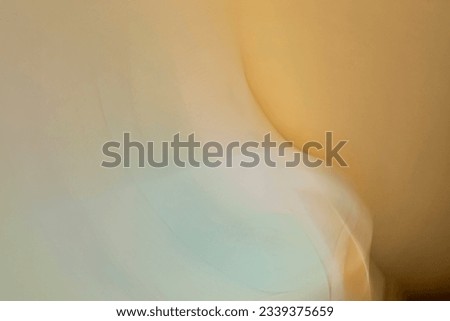 abstract fuzzy blurred golden, yellow, green, white, orange, and red mysterious festive background