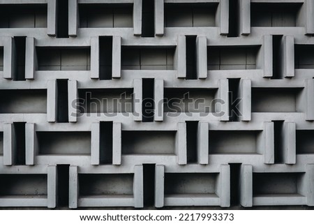 Abstract geometric background of the concrete, part of a modernist building.