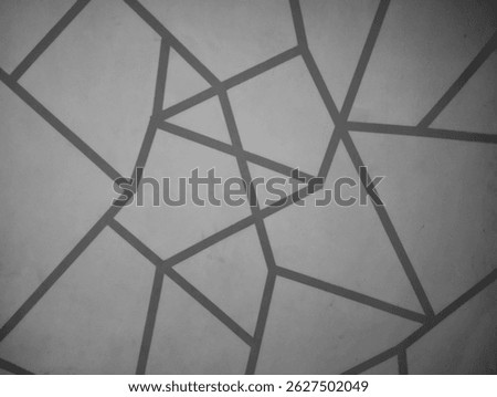Abstract geometric black lines pattern on gray background. Modern minimalist design with intersecting angular shapes. Ideal for backgrounds, digital art, architecture, or contemporary graphic projects