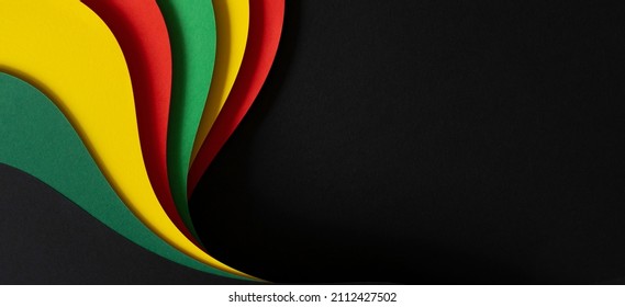 Abstract geometric black, red, yellow, green color background. Black History Month color background with copy space for text - Shutterstock ID 2112427502