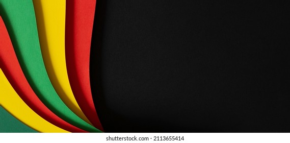 Abstract geometric black, red, yellow, green color background. Black History Month color background with copy space for text
