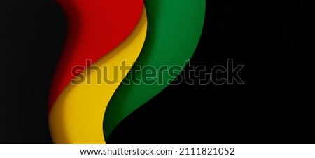 Abstract geometric black, red, yellow, green color banner background. Black History Month color background with copy space for text