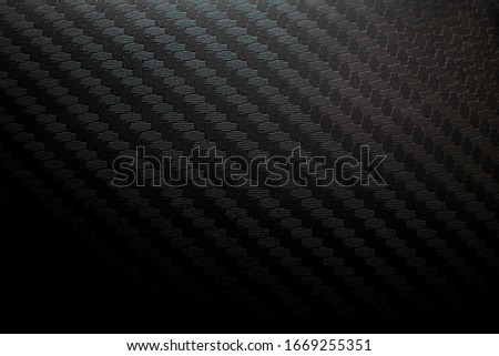 Abstract geometric carbon background. Modern dark texture. Minimalist Black.
