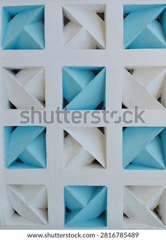 Abstract geometric concrete roster pattern background with white and blue colors.