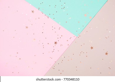 Abstract geometric festive background with stars. Festive paper background with glitter stars on it.