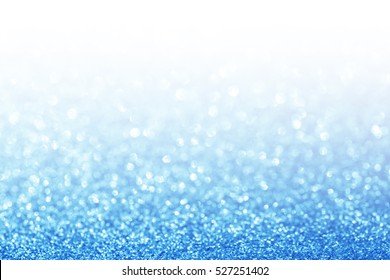 Abstract glitter blue background. Holiday shiny texture.