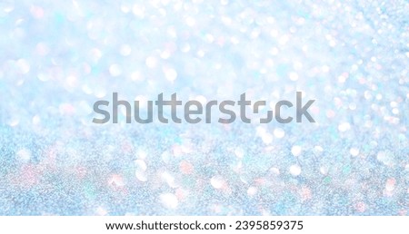 Abstract glitter lights background. de-focused