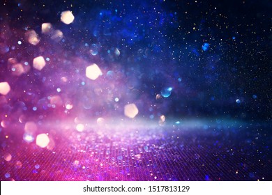 Abstract Glitter Pink, Purple And Blue Lights Background. De-focused