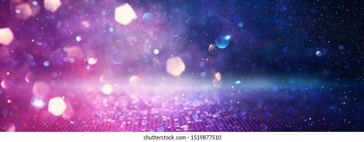 Abstract Glitter Pink, Purple And Blue Lights Background. De-focused. Banner