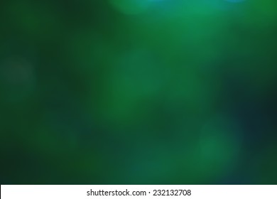 Abstract Glowing Light On A Green Background