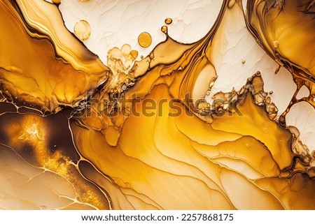 Abstract gold alcohol ink background, hand painted liquid ink gold splashes effect