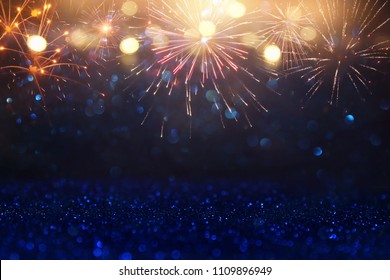 Abstract Gold, Black And Blue Glitter Background With Fireworks. Christmas Eve, 4th Of July Holiday Concept