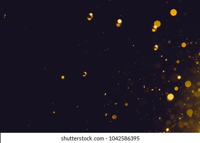 Abstract Gold Bokeh On Black Background