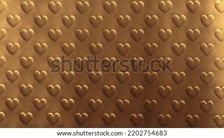 Abstract gold and bronze texture color light shadow background. Paper with relief heart shape.