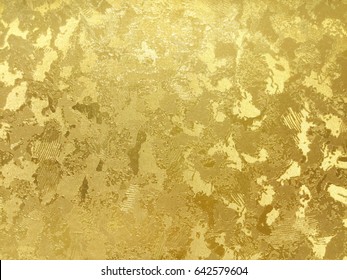 Abstract Gold Color Painted On Grunge Rough Surface Of Stucco Concrete Wall. Golden Texture Background And Wallpaper