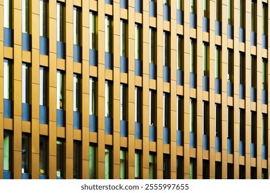 Abstract Golden Facade with Vertical Panels and Geometric Repetitions in Modern Architecture - Powered by Shutterstock