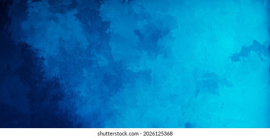 Abstract gradient bright blue background. Panoramic grunge navy blue stucco wall background. Beautiful Wide angle rough stylized texture wallpaper with copy space for design