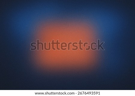 Abstract Gradient of Orange and Deep Blue with Grainy Texture background.