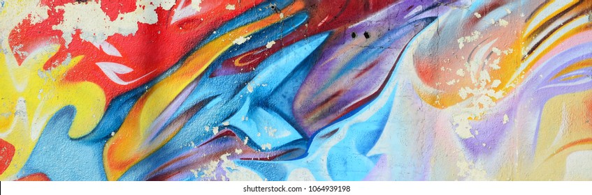 Abstract graffiti paintings on the concrete wall. Background texture