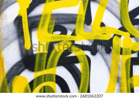 Abstract graffiti pattern in bold yellow, black on white background. Urban, vibrant, with street, edgy appeal. Creative poster, flyer, digital art, modern urban art display.