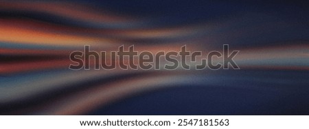 Abstract grainy background with blurred dynamic streaks of red, blue, and orange blending into dark tones, glowing effect