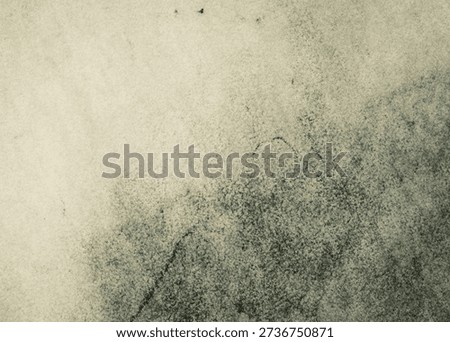 Abstract graphite texture with warm beige and gray tones, showing soft pencil shading and organic grain. Versatile artistic background suitable for print, web, and contemporary design projects.