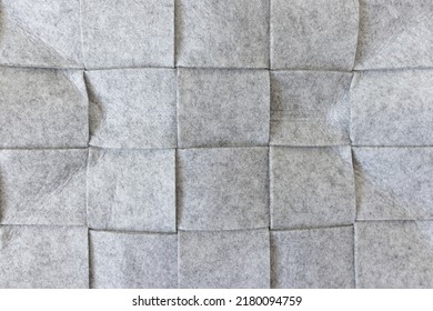 Abstract Gray Felt Background. Home Storage Basket Made Of Soft Grey Felt Material. Surface Of Felted Wool Fabric Texture. Close-up, Square Pattern