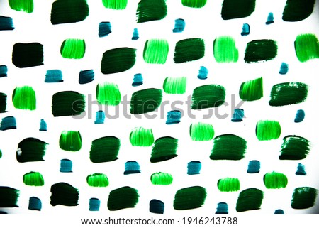 Abstract green background, hand painted texture, painted with acrylics, splashes, drops of paint, paint strokes. Design for backgrounds, wallpapers, covers and packaging.