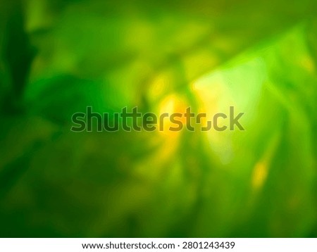 An abstract green background with intricate patterns, reflecting light from the background and in the center.