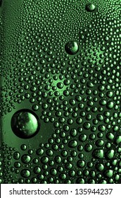 abstract  green drop in a plastic material