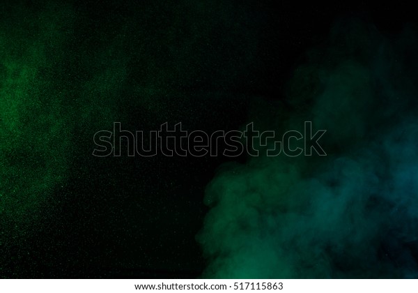 Abstract\
green water vapor on a black background. Texture. Design elements.\
Abstract art. Steam the humidifier. Macro\
shot.